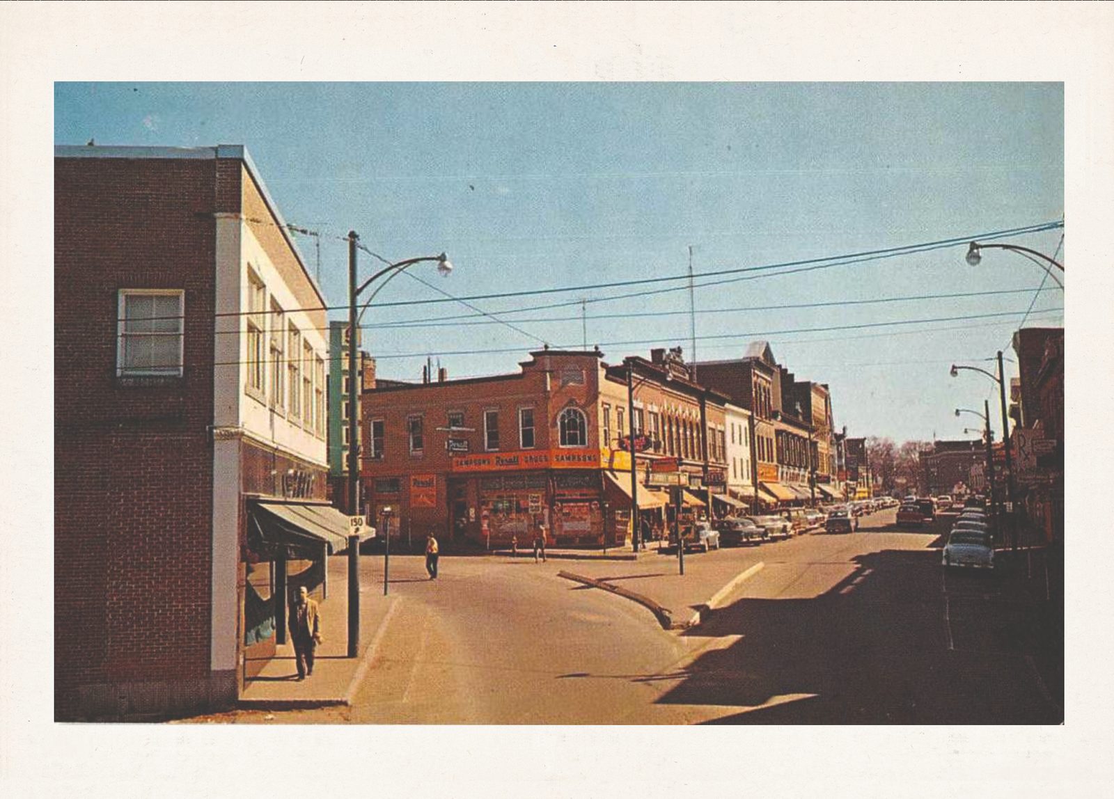 Vintage postcard of downtown Skowhegan storefronts